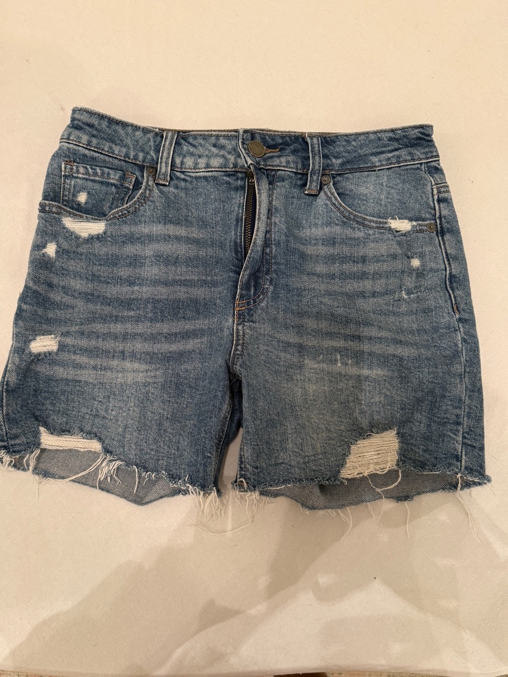 PAIGE Sarah longline short with raw hem in haddie destructed wash (27)